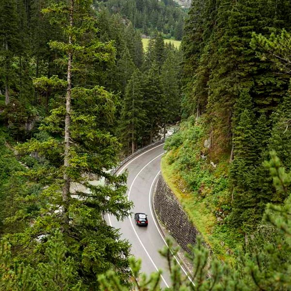 Car driving on a scenic mountain road