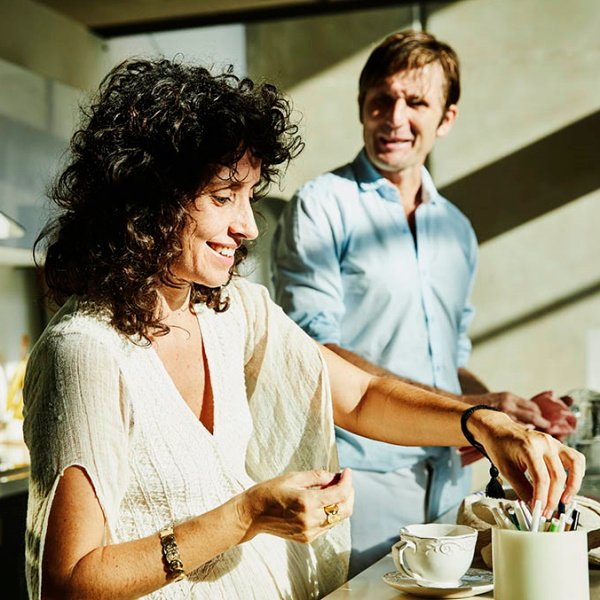 Couple spending time together in their kitchen at home