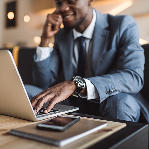 Insurance agent working on a laptop